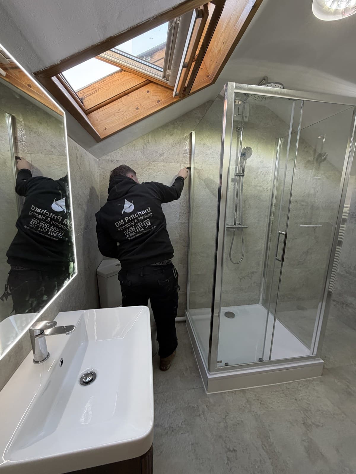 DM Pritchard engineers fitting a new bathroom